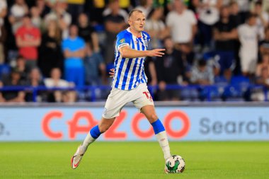 William Boyle #12 of Huddersfield Town runs with the ball