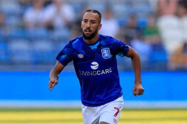Sorba Thomas #7 of Huddersfield Town warms up for the game