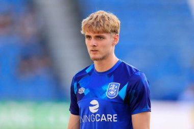Jack Rudoni #22 of Huddersfield Town warms up for the game