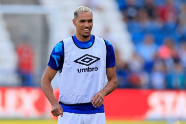 John Russell #5 of Huddersfield Town warms up for the game