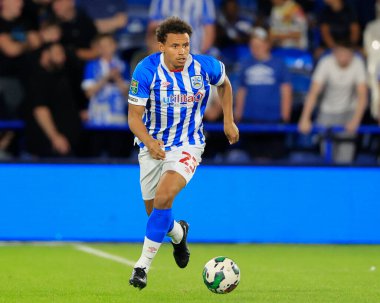 Rarmani Edmonds-Green #23 of Huddersfield Town runs with the ball