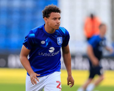 Rarmani Edmonds-Green #23 of Huddersfield Town warms up for the game