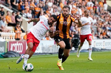 Liam Ridehalgh #3 of Bradford City competes for the ball with Allahyar Sayyadmanesh #9 of Hull City