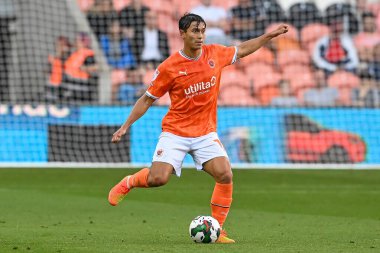 Kenny Dougall #12 of Blackpool in action during the game