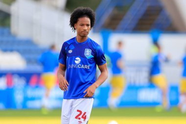 Etienne Camara #24 of Huddersfield Town warms up for the game