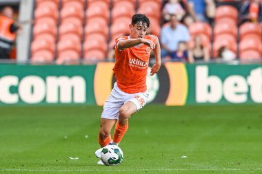 Charlie Patino #28 of Blackpool makes a break with the ball