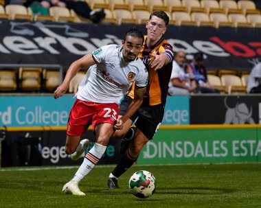 Randell Williams #23 of Hull City breaks past Richard Smallwood #6 of Bradford City  