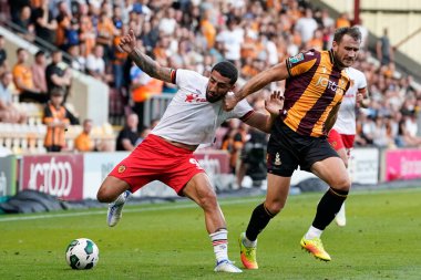 Liam Ridehalgh #3 of Bradford City competes for the ball with Allahyar Sayyadmanesh #9 of Hull City