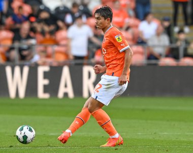Kenny Dougall #12 of Blackpool in action during the game