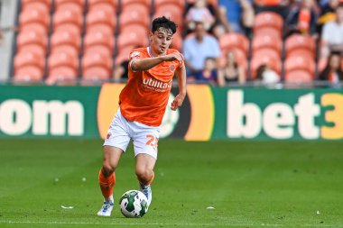 Charlie Patino #28 of Blackpool makes a break with the ball