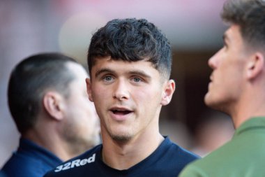 Ryan Giles #3 of Middlesbrough watches the pre match warm up from the dug out 