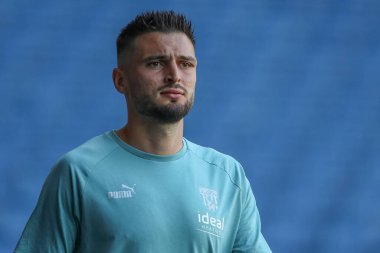 Okay Yokuslu #35 of West Bromwich Albion arrives at the game prior to kick off