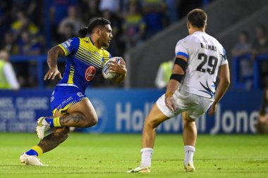 Thomas Mikaele #33 of Warrington Wolves in action