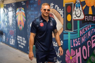 Oliver Holmes #12 of Warrington Wolves arrives at the Halliwell Jones Stadium