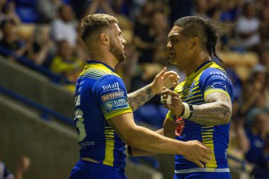 Connor Wrench #23 of Warrington Wolves celebrates his try