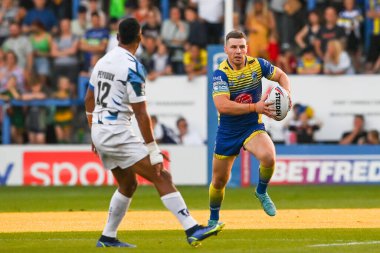George Williams #7 of Warrington Wolves makes a break
