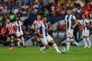 Alex Mowatt #27 of West Bromwich Albion passes the ball