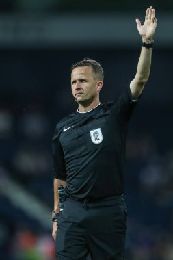 Referee David Webb points to give a corner kick
