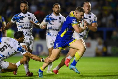 George Williams #7 of Warrington Wolves makes a break