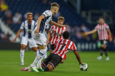 Zac Ashworth #26 of West Bromwich Albion fouls Rhian Brewster #7 of Sheffield United