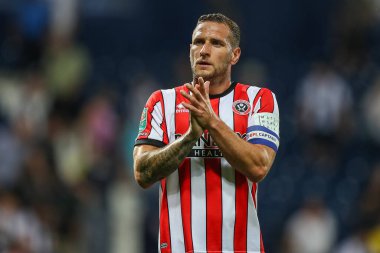 Billy Sharp #10 of Sheffield United applauds the away fans after full time