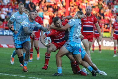Matt Parcell #9 of Hull KR reaches out to score the first try of the match