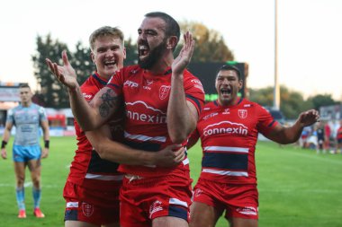 Kane Linnett #12 of Hull KR celebrates his try