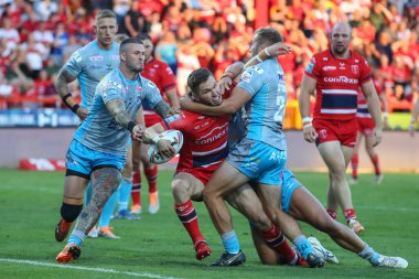Matt Parcell #9 of Hull KR reaches out to score the first try of the match