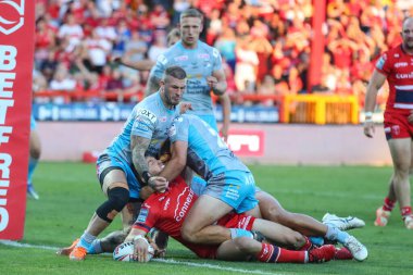 Matt Parcell #9 of Hull KR scores the first try of the match