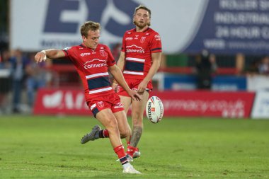 Jez Litten #14 of Hull KR puts a high kick up