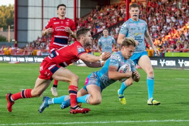 Brad Dwyer #14 of Leeds Rhinos goes over for a try and makes the score 10-4 during the first half 