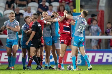 A fight breaks out between the two teams at the end of the first half 