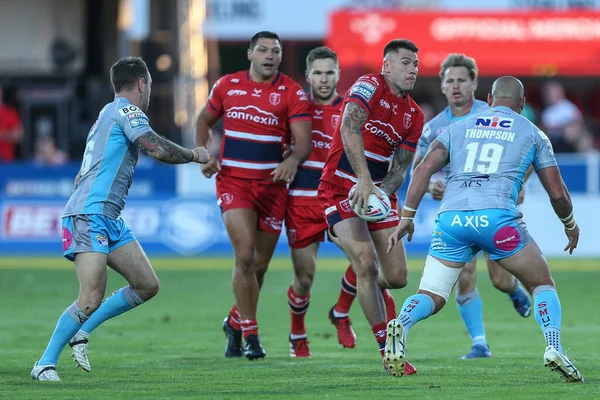 Shaun Kenny-Dowall #4 of Hull KR runs at the Leeds defence