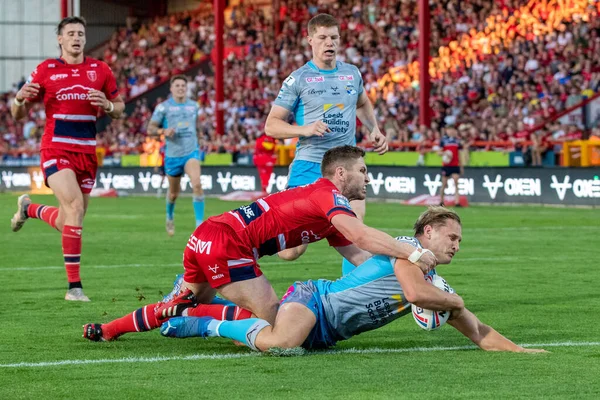 Brad Dwyer #14 of Leeds Rhinos goes over for a try and makes the score 10-4 during the first half 