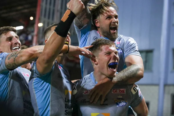 Morgan Gannon #21 of Leeds Rhinos celebrates his try 