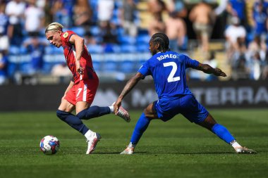 Przemys?aw P?acheta #17 of Birmingham City  takes on Mahlon Romeo #2 of Cardiff City  