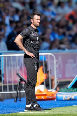 Danny Schofield manager of Huddersfield Town watches the game 