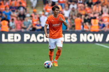 Kenny Dougall #12 of Blackpool in action during the game