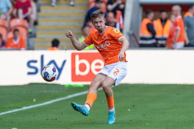 Callum Connolly #2 of Blackpool passes the ball