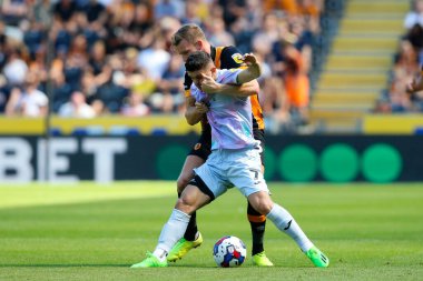Callum Elder #3 of Hull City and Milot Rashica #7 of Norwich City 