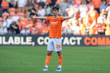 Charlie Patino #28 of Blackpool appeals to Referee Andy Woolmer