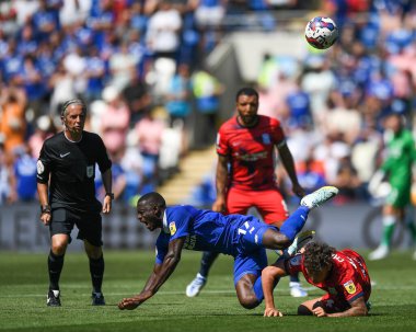 Jamilu Collins #17 of Cardiff City  tackled by Alfie Chang #42 of Birmingham City 