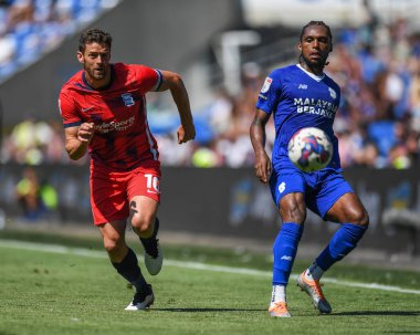 Mahlon Romeo #2 of Cardiff City  Under pressure from Lukas Jutkiewicz #10 of Birmingham City  