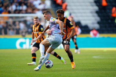 Vaughn Covil #49 of Hull City and KennyMcLean #23 of Norwich City  