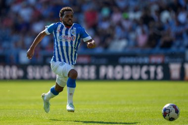 Sorba Thomas #7 of Huddersfield Town chases a loose ball