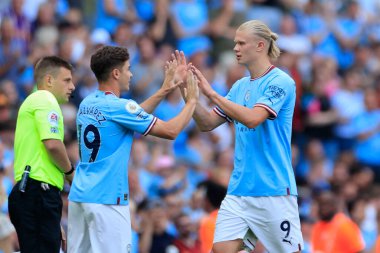 Erling Haaland #9 of Manchester City is substituted in the 74th minute for Julian Alvarez #19 of Manchester City