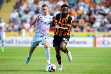KennyMcLean #23 of Norwich City and Benjamin Tetteh #30 of Hull City  