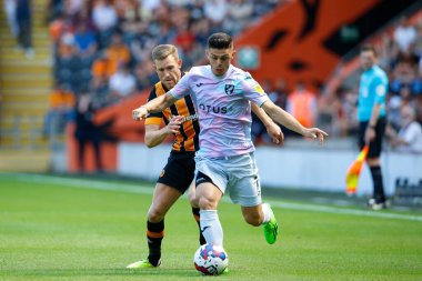 Callum Elder #3 of Hull City and Milot Rashica #7 of Norwich City 