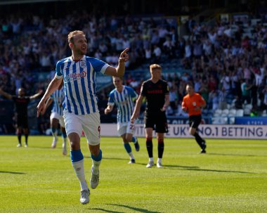 Jordan Rhodes #9 of Huddersfield Town celebrates scoring his sides 3rd goal too go 3-1 up