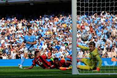Phil Foden #47 of Manchester City scores to make it 3-0
